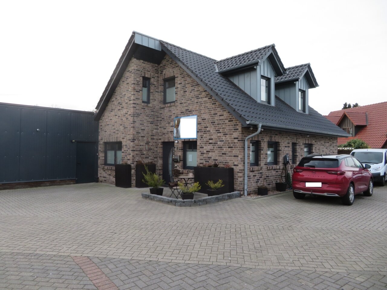 Löningen: Einfamilienhaus mit angebauter Halle   Löningen: Einfamilienhaus mit angebauter Halle